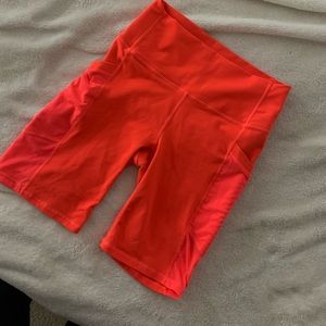 Fabletics Powerhold neon orange biker shorts small